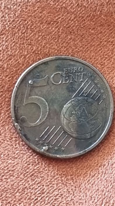 Moeda com erro de cunhagem excesso de metal