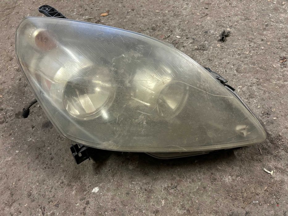 Opel ZAFIRA B 05-09 lampa PRAWA przednia GM / EUROPA wysyłka oryginał