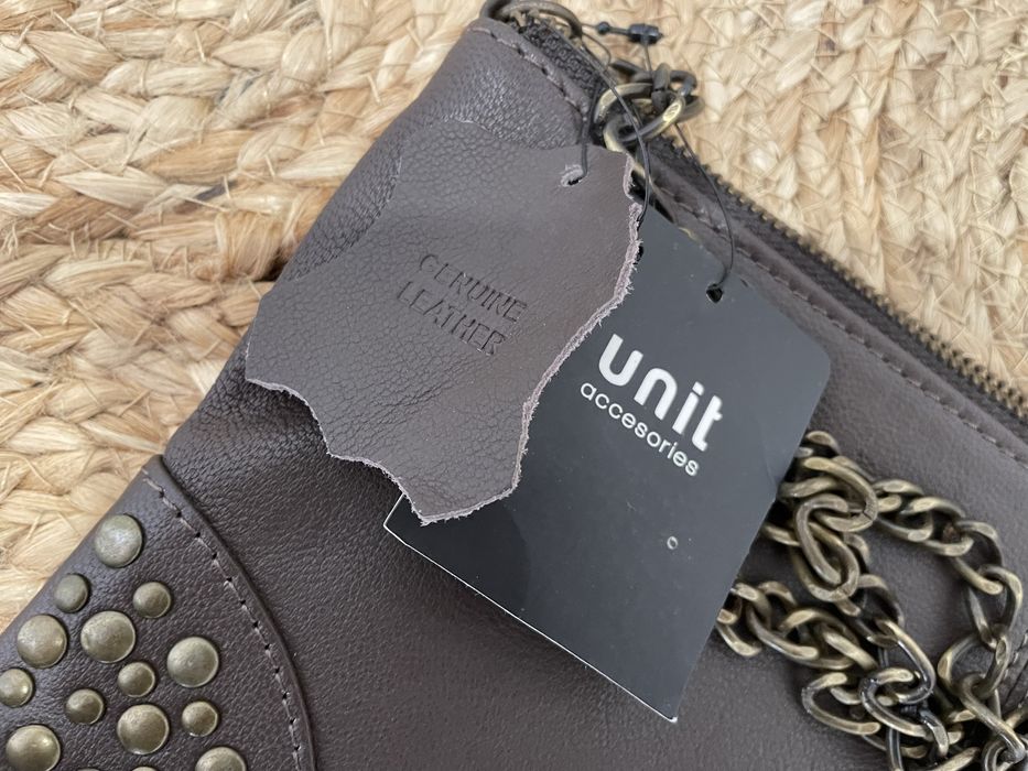 Mala tiracolo em pele