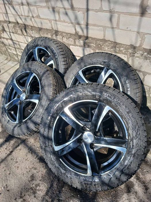 Продам колёса " зимняя резина + диски ( титаны )