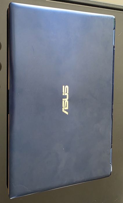 Laptop -tablet asus  niebieski mały stan bardzo dobry