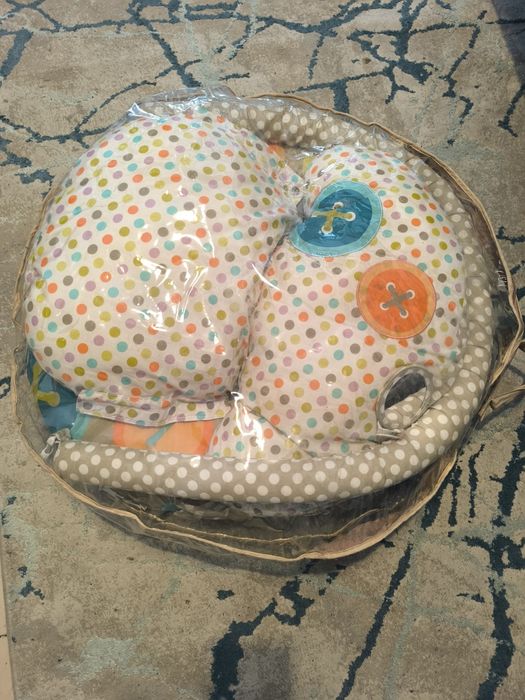 Almofada de amamentação e parque