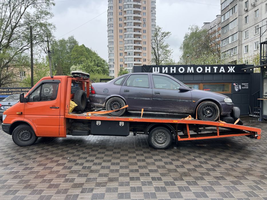 Послуги еакуатора та вантажні перевезення