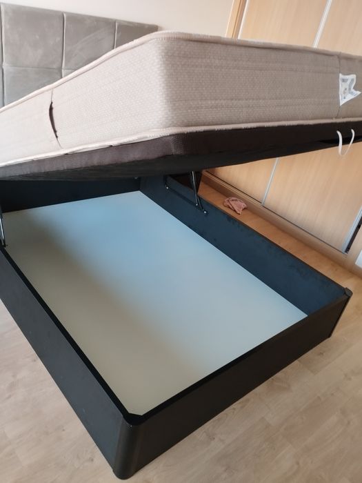 Cama com arrumação