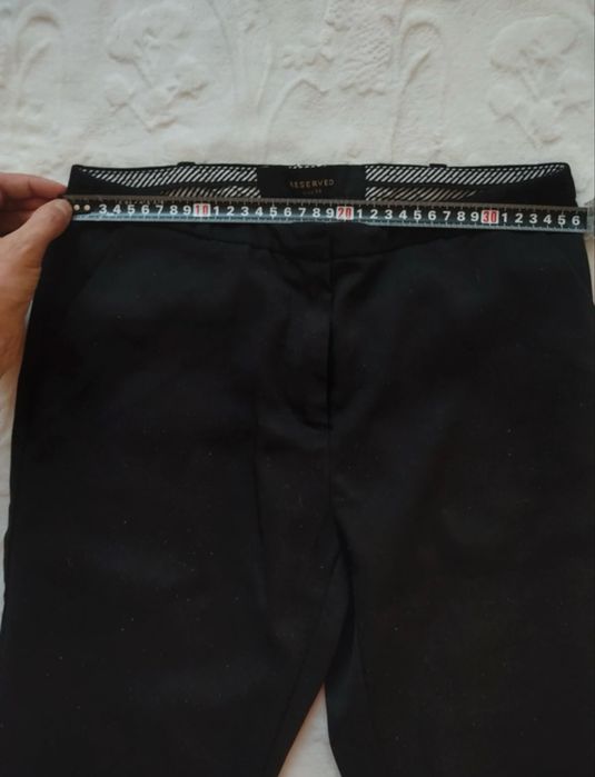 Eleganckie czarne spodnie rozm. 34 firmy Reserved