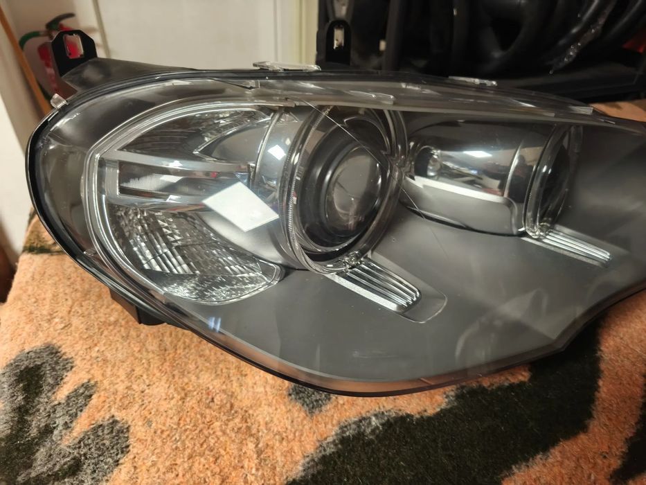 Conjunto de faróis bi-xenon direcional BMW X5 E70 lci