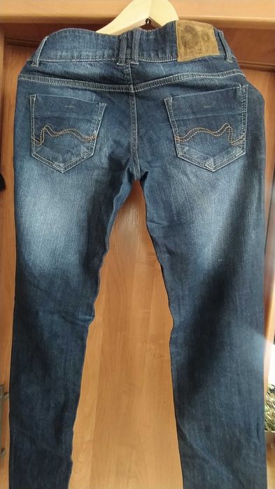 Damskie jeansy Reserved r. 27/32