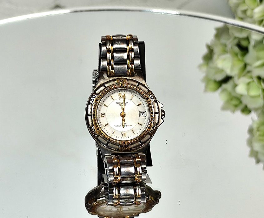 Damski zabytkowy zegarek kwarcowy SEKONDA
