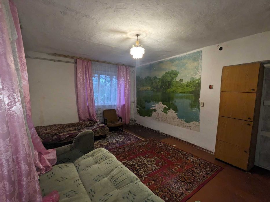 Продається земельна ділянка з одноповерховим цегляним будинком