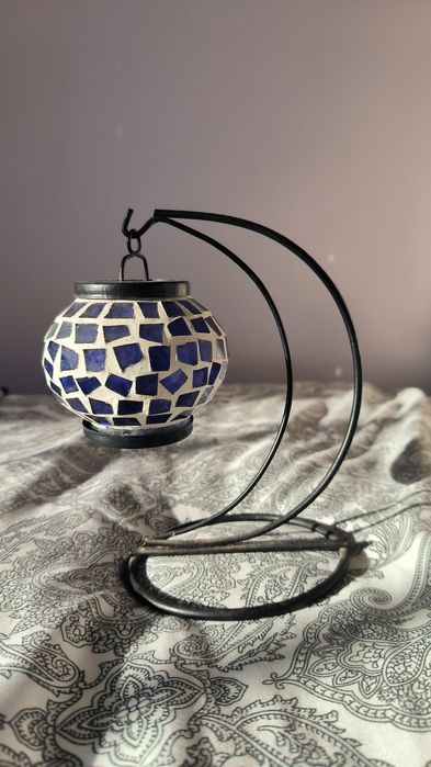 Suporte para vela com base em ferro