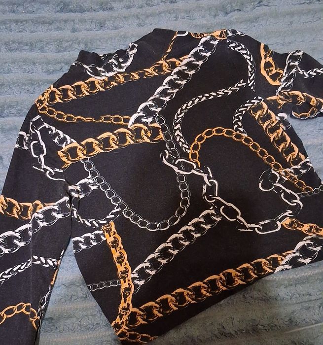 Жіночі кофти/топи