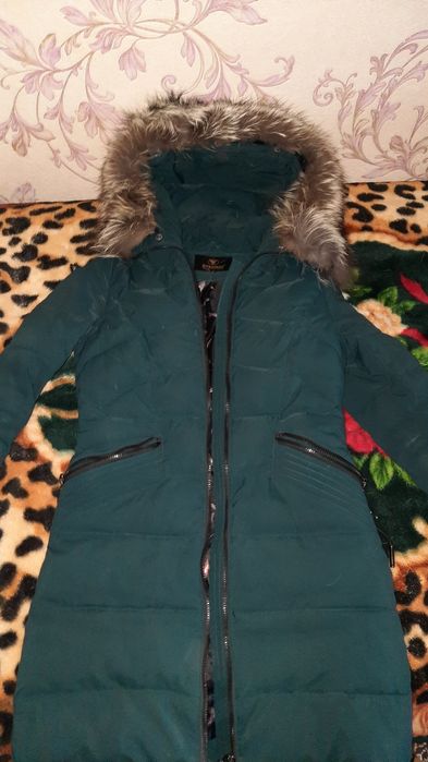 Продам пуховик в гарному стані