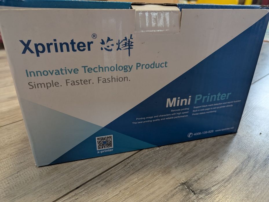 Принтер чеків Xprinter XP-Q200 та касова стрічка.