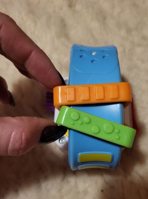 Zegarek i piesek do ciągnięcia fisher price.