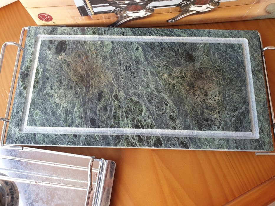 Grelhador em pedra com lamparina