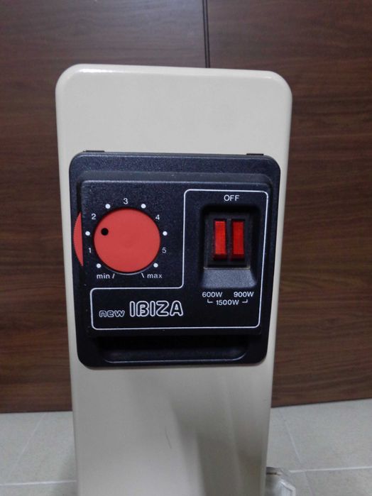 Aquecedor eléctrico a óleo