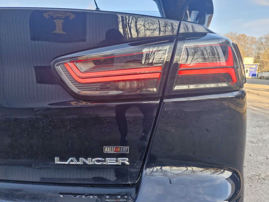 Митсубиши Лансер Х