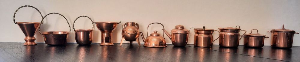 Conjunto de miniaturas em cobre