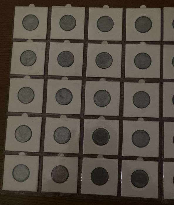 Duas séries completas de 50 centavos de alpaca e bronze
