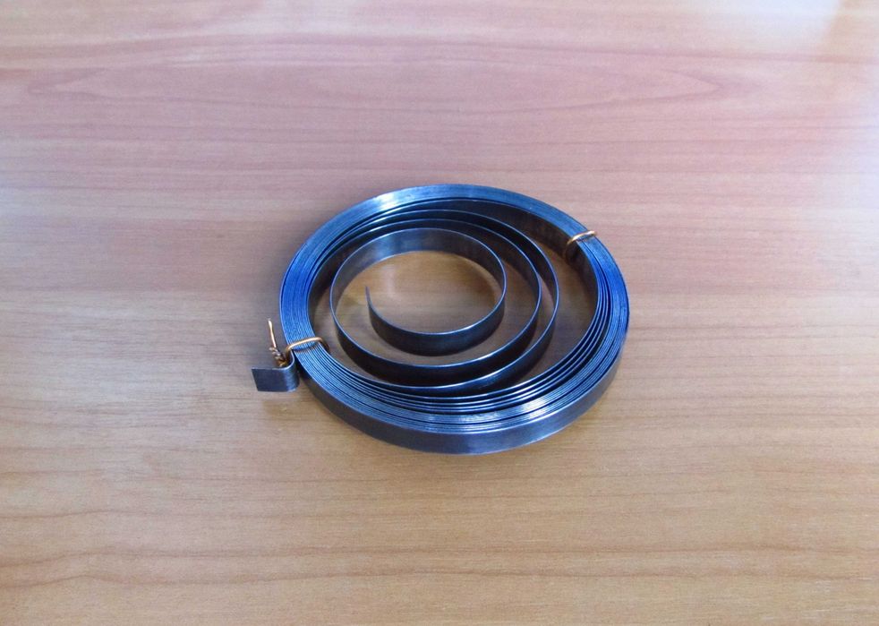 Пружина сматывающего механизма пылесоса