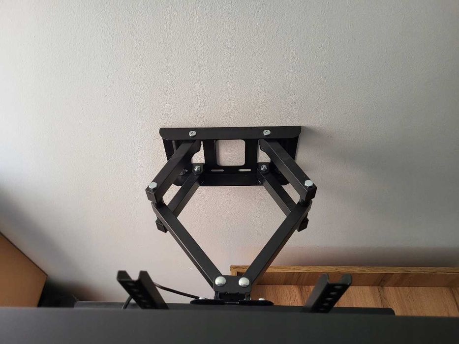 Uniwersalny wieszak TV narożny VESA do 50 kg