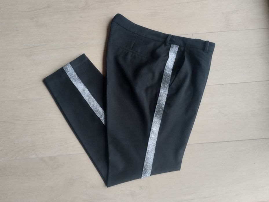Mohito eleganckie czarne spodnie ze srebrnymi lampasami r. 42 L