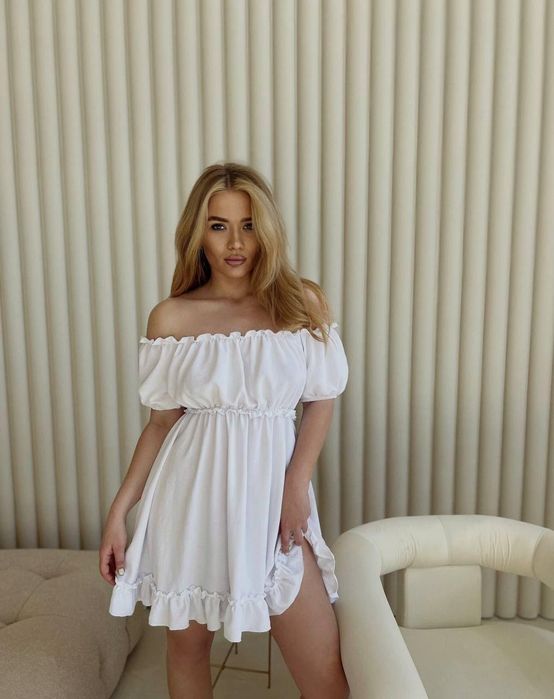 Біла сукня 42-46 підійде тягнеться