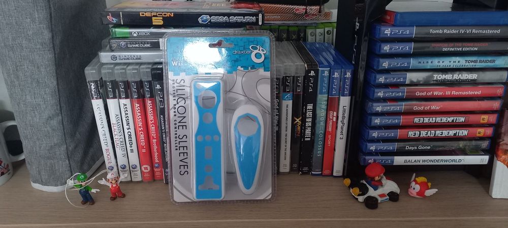 Conjunto de proteções de silicone para controladores de Wii

- Cor az