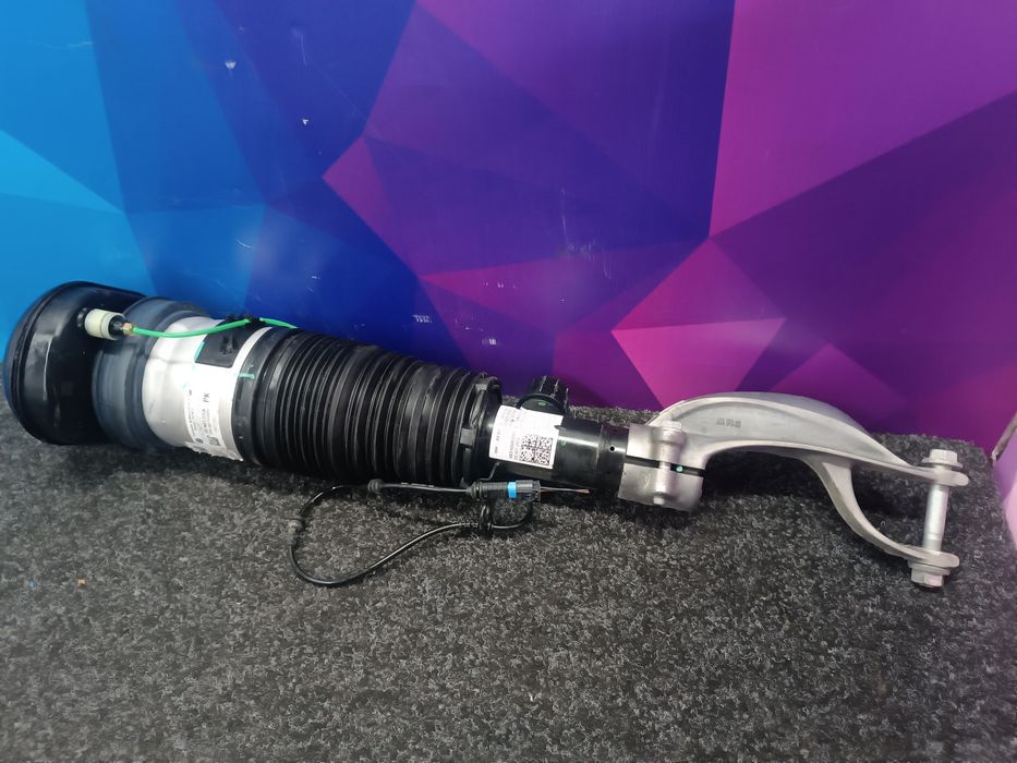 Пневмостійка передня ліва BMW G07 37106869035 Пневмостойка Балон