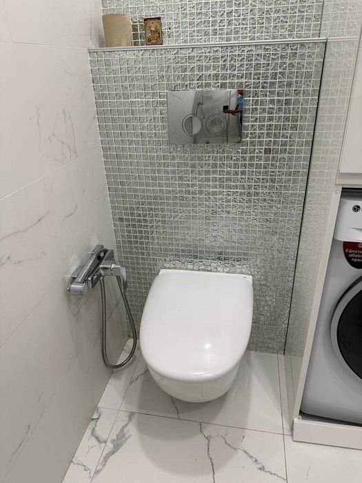 Унітаз підвісний RAK Ceramics Sensation SENWC1446AWHA з кришкою