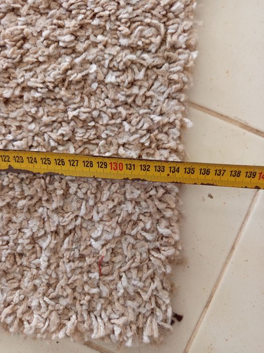 Tapetes de pêlo bege