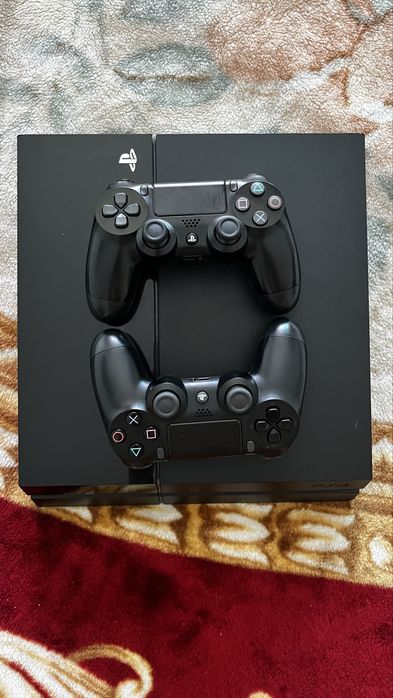 vendo ps4+2comandos+4jogos