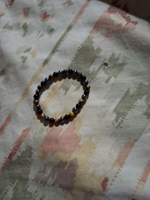 Pulseira castanha e preta