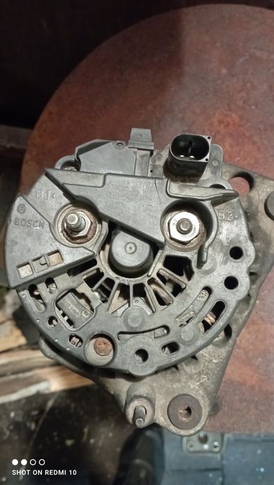 Генератор Бош Опель Віваро 1.9