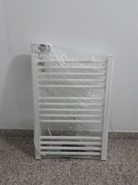 Pratico e útil Toalheiro Eléctrico