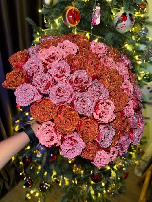 Букети з атласної стрічки та цукерок та памперсів.