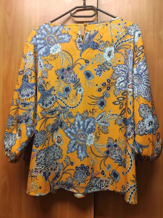 Pomarańczowa, elegancka bluzka w orientalne kwiaty