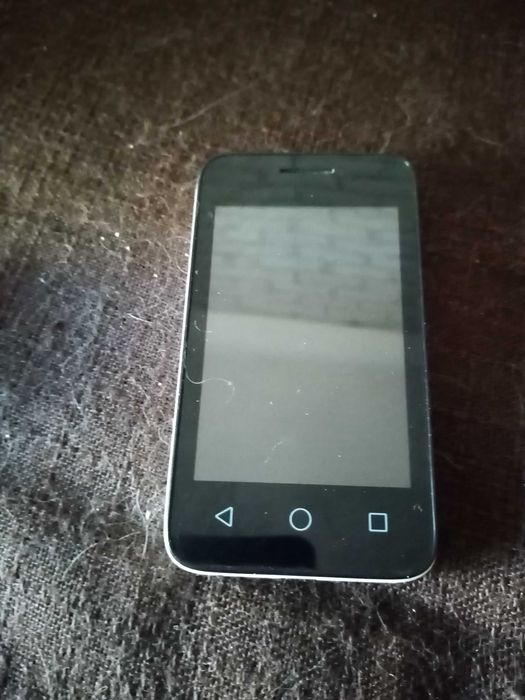 Телефон мобільний.