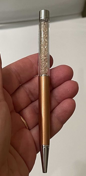 Caneta Swarowski dourada e com cristais dourados
