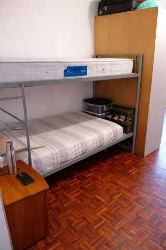Cama em quarto partilhado