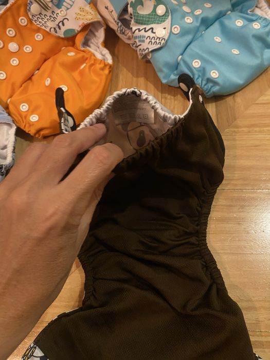 Conjunto de fraldas reutilizaveis e absorventes