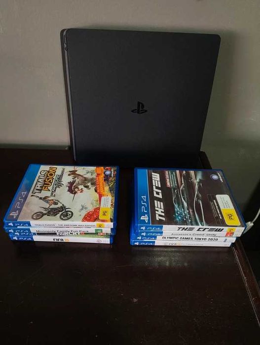 Playstation 4 (PS4) (1TB), como seminova (c/câmara, comandos e jogos)64739695265153120