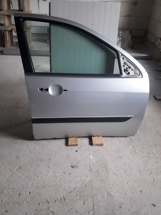 Двері Форд Фокус МК 1 хетчбек