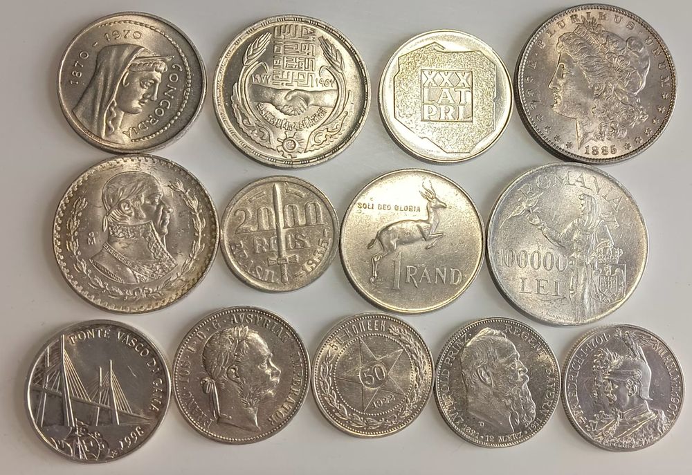 Продам срібні монети з блиском