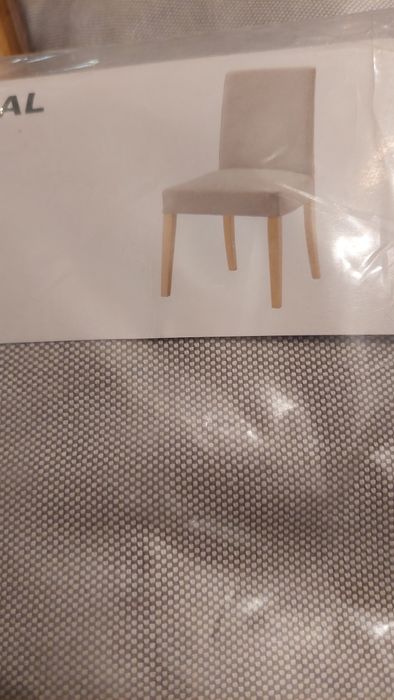 Capas da cadeira Henriksdal de cor cinza claro.