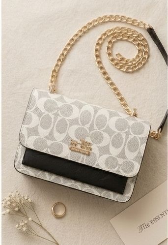 Torba z klapką Coach Signature listonoszka