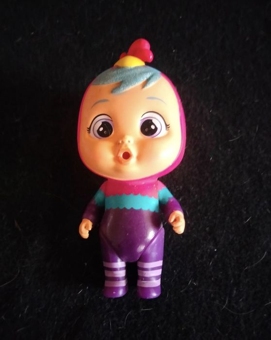 2 brinquedos o pato e a pilhas