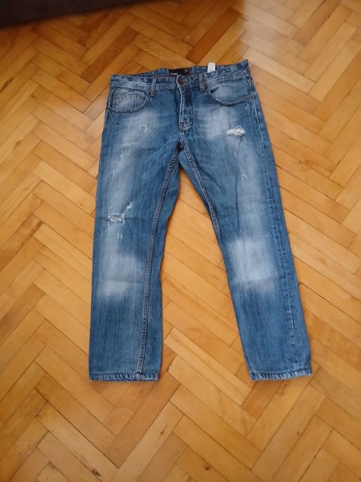 Spodnie jeans męskie z przetarciami  New Yorker  34