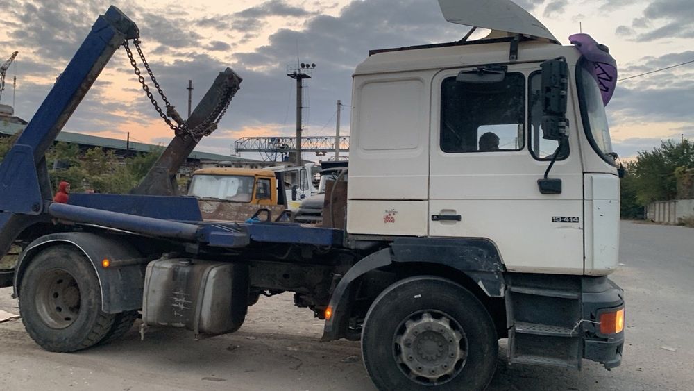 МАН 19.414-бункеровоз для вывоза крупногабаритных отходов контейнерами