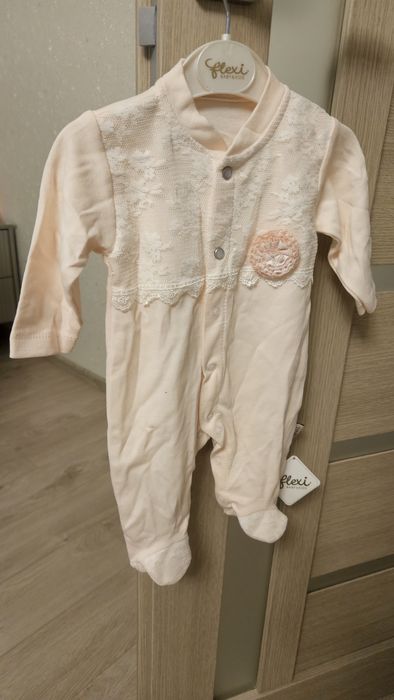 Рожевий чоловічок жля діічинки 6_9 місяців